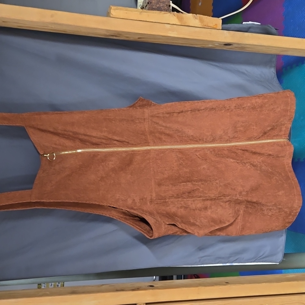 2 corduroy skirts one button up one zipper both have shoulder straps